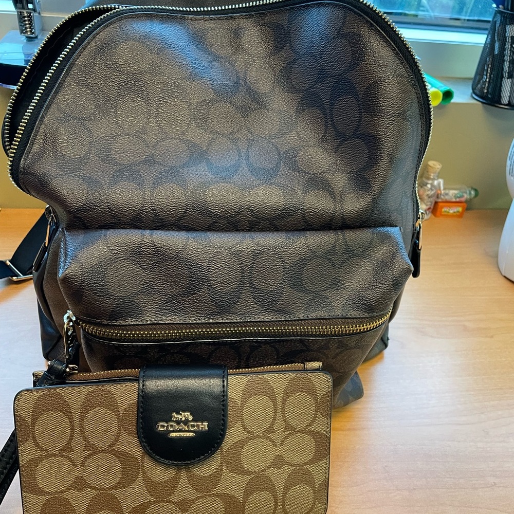 Coach leather back pack wallet with cellular holder